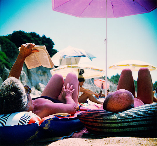 'UltraViolet couple' on beach, Rhodos, Greece taken with a Russian LOMO Lubitel camera - the practice of using these cameras is known as Lomography which in this digital driven age, has developed a cult following - Getty ref: 3413-000016 - 
  direct link on contact page