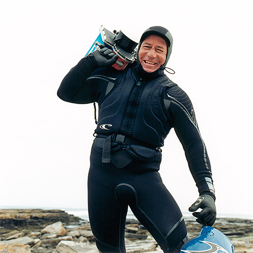 Larry Haynes, legendary surf photographer at Brims Ness, Scotland at the O'Neill Highland Open 2006